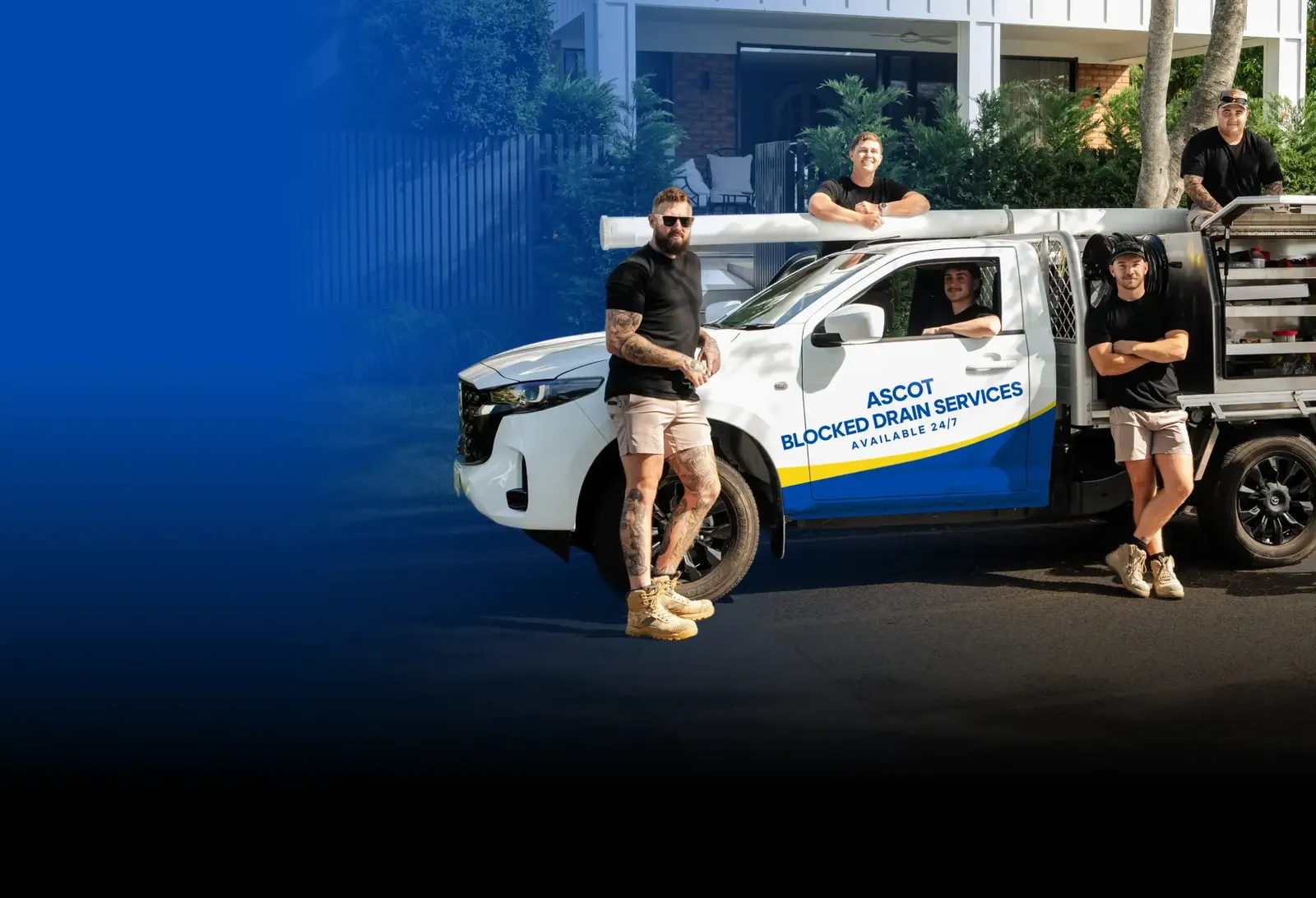 Ascot Blocked Drain Services team with the ute